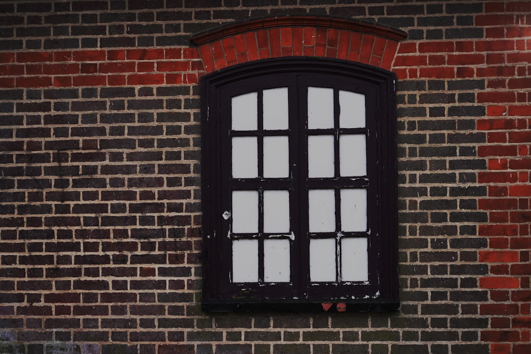 Town Centre, Luton: a red brick building with a black window
